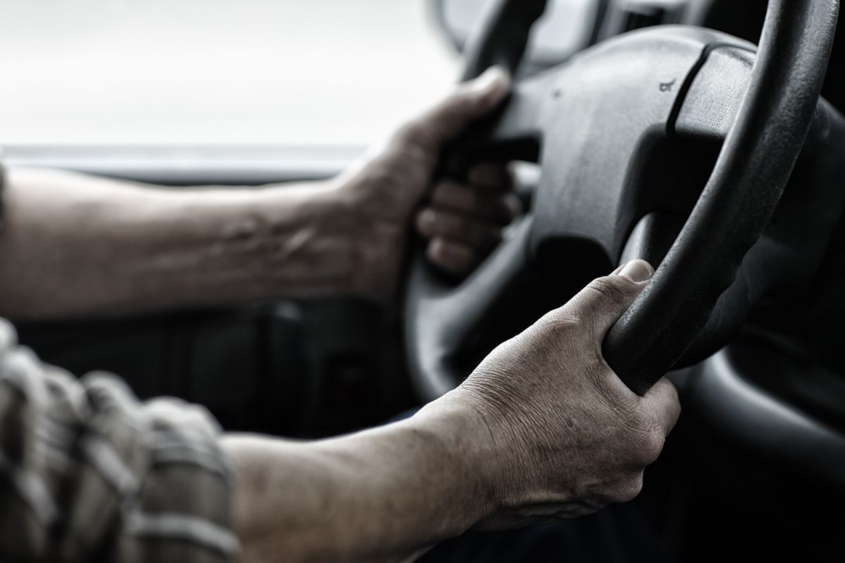 American Truck Driver at the Wheel