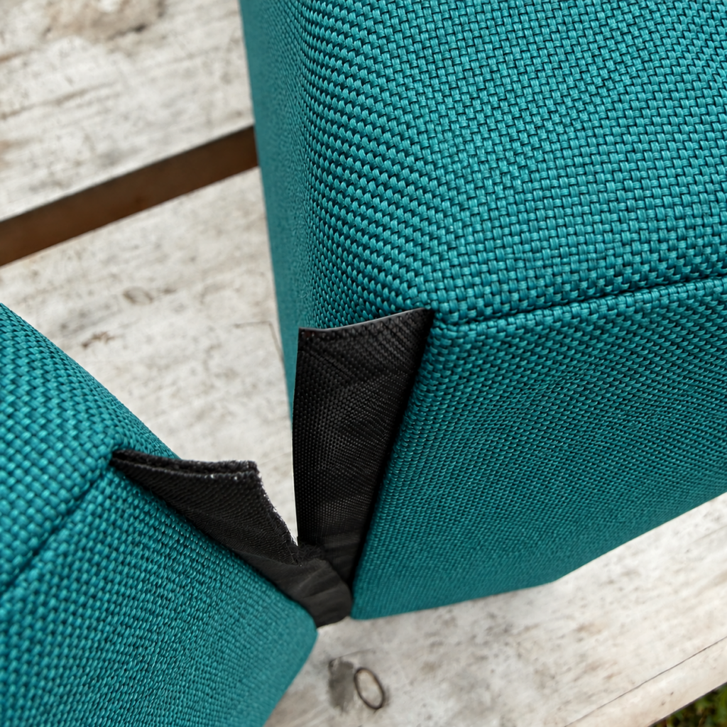 Velcro hinge between cushion sections.