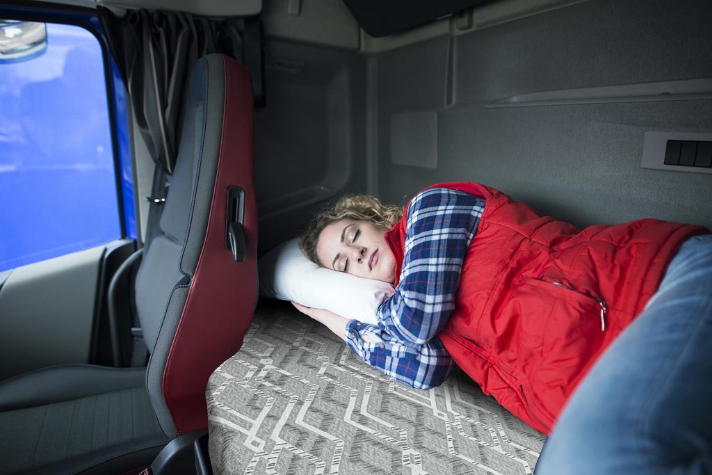 Woman driver resting on Road Elite